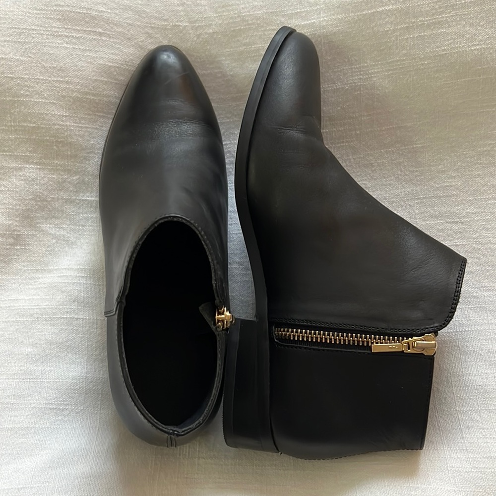 Nisolo waterproof black ankle boots.